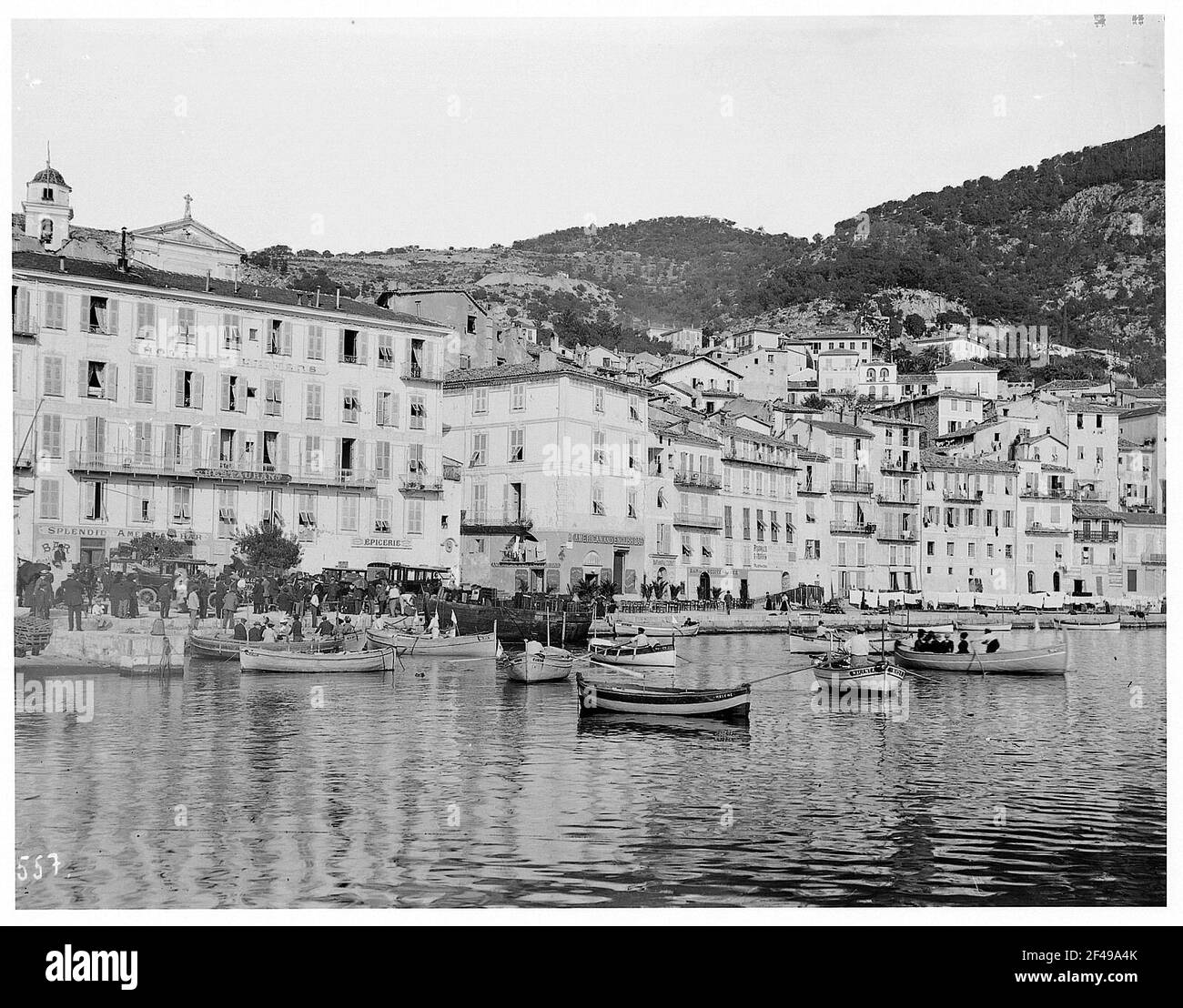 Villefranche / France: Landing plate. Tourists are brought to rowing boats in land; Jetty for tourist boats directly in front of a large hotel on the water Stock Photo