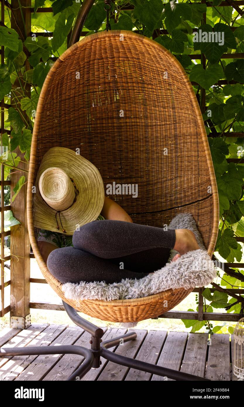 Legs hanging chair hi-res stock photography and images - Alamy