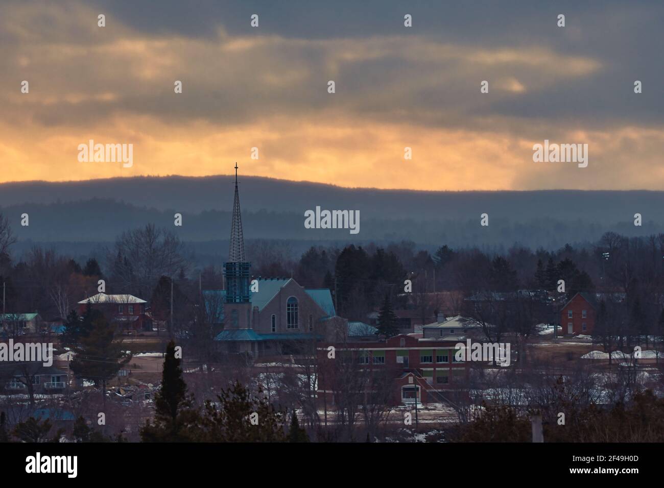 The southern section of the small town of Eganville, Ontario, Canada  is seen from atop a hill at dusk on March 12, 2021. Stock Photo