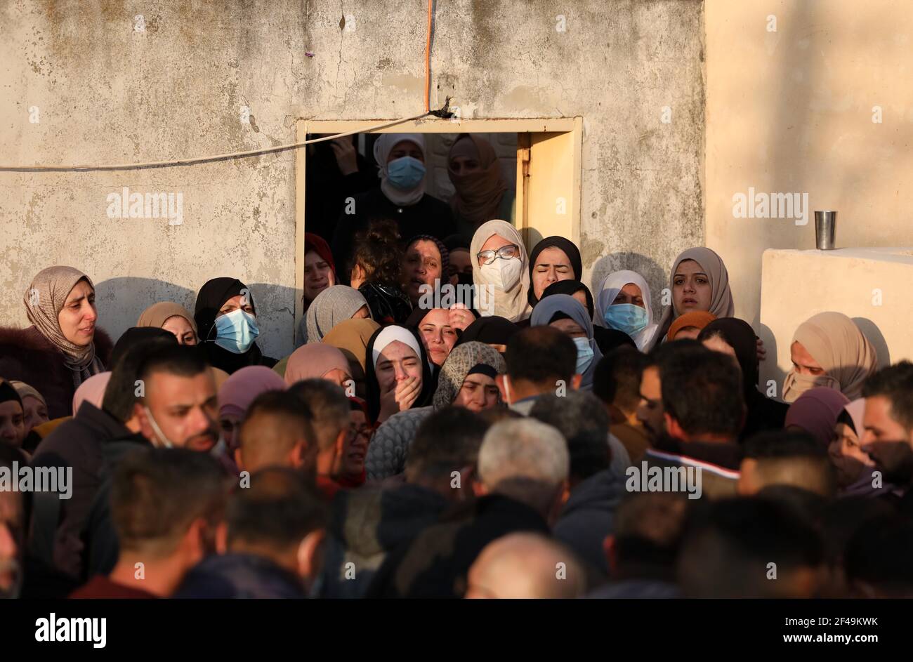 Nablus, Nablus. 19th Mar, 2021. Relatives of Palestinian Atef Yousef Hanaysha mourn during his funeral in the West Bank village of Beit Dajan, east of Nablus, on March 19, 2021. Atef Yousef Hanaysha was shot dead by Israeli soldiers on Friday afternoon in an anti-settlement rally near Beit Dajan village, medics said. Credit: Ayman Nobani/Xinhua/Alamy Live News Stock Photo