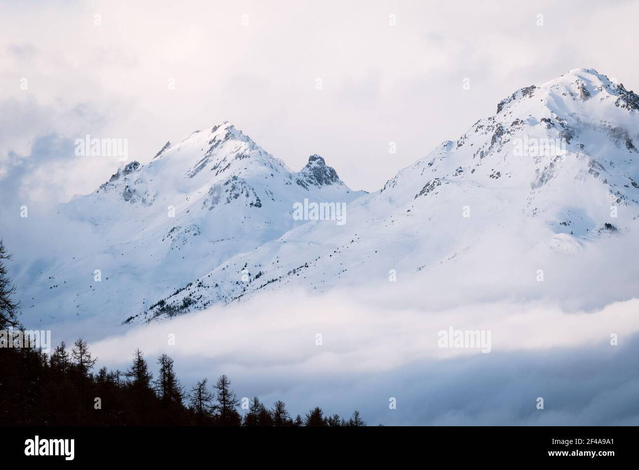 Foggy winter mountain landscape. Panoramic view of mountains near Brianson, Serre Chevalier resort, France. Ski resort landscape. Snowy mountains Stock Photo - Alamy Foggy winter mountain landscape. Panoramic view of mountains near Brianson, Serre Chevalier resort, France. Ski resort landscape. Snowy mountains Stock Photo - Alamy
