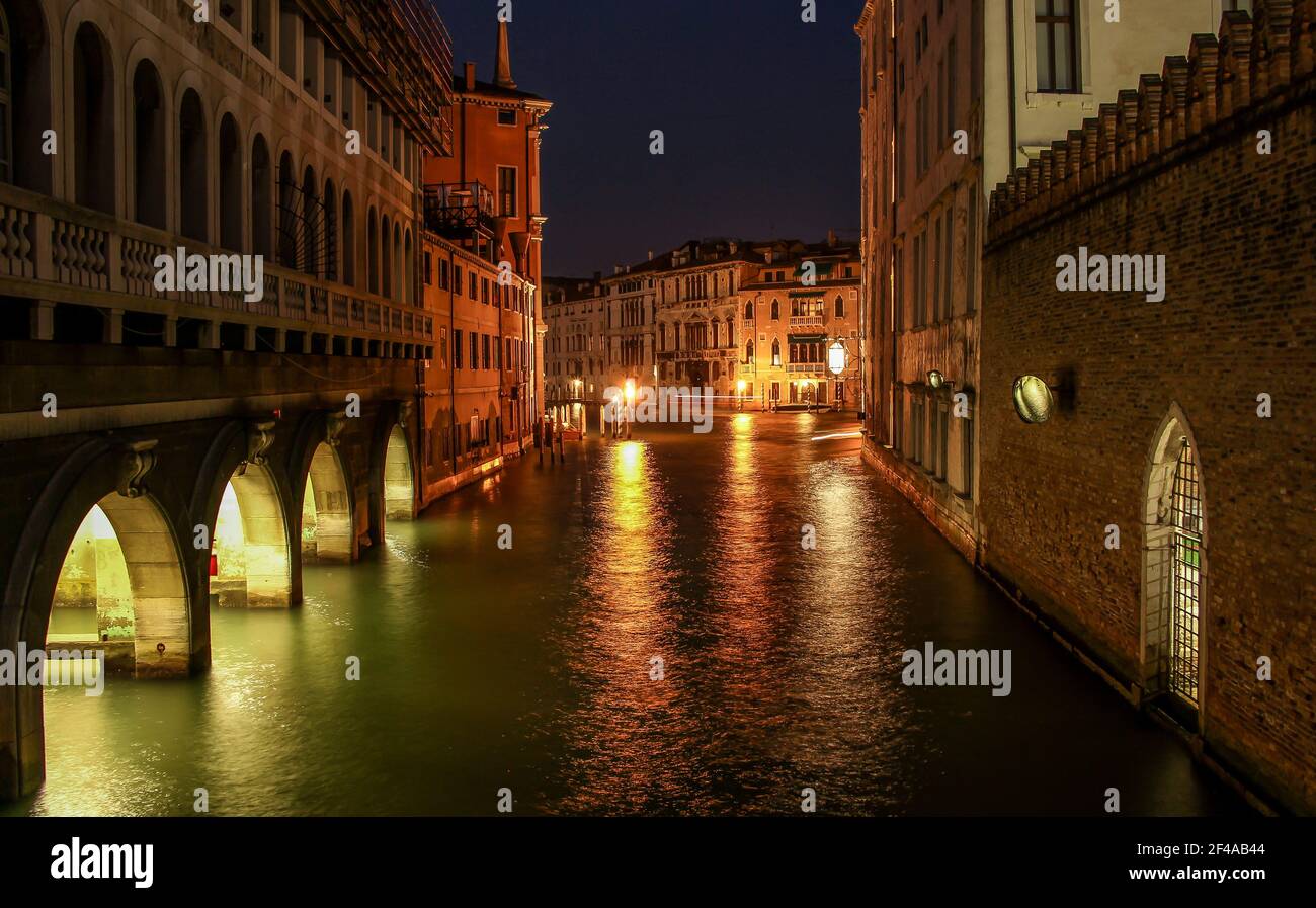 Nighttime view of a canal in Venice Stock Photo - Alamy