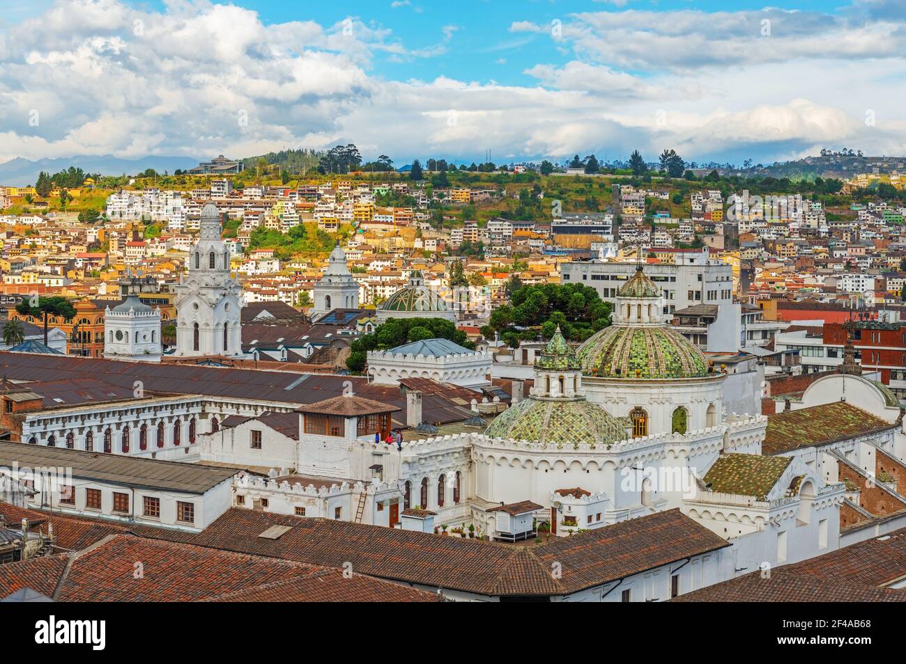 Aerial cityscape of the historic city center of Quito with the Compania de Jesus church dome, Ecuador. Stock Photo