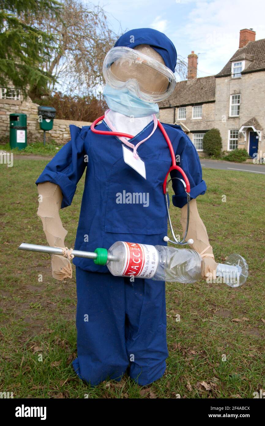 A village community in Islip tells the story of the covid-19 pandemic through a display of hand made effigies, 2021 Stock Photo
