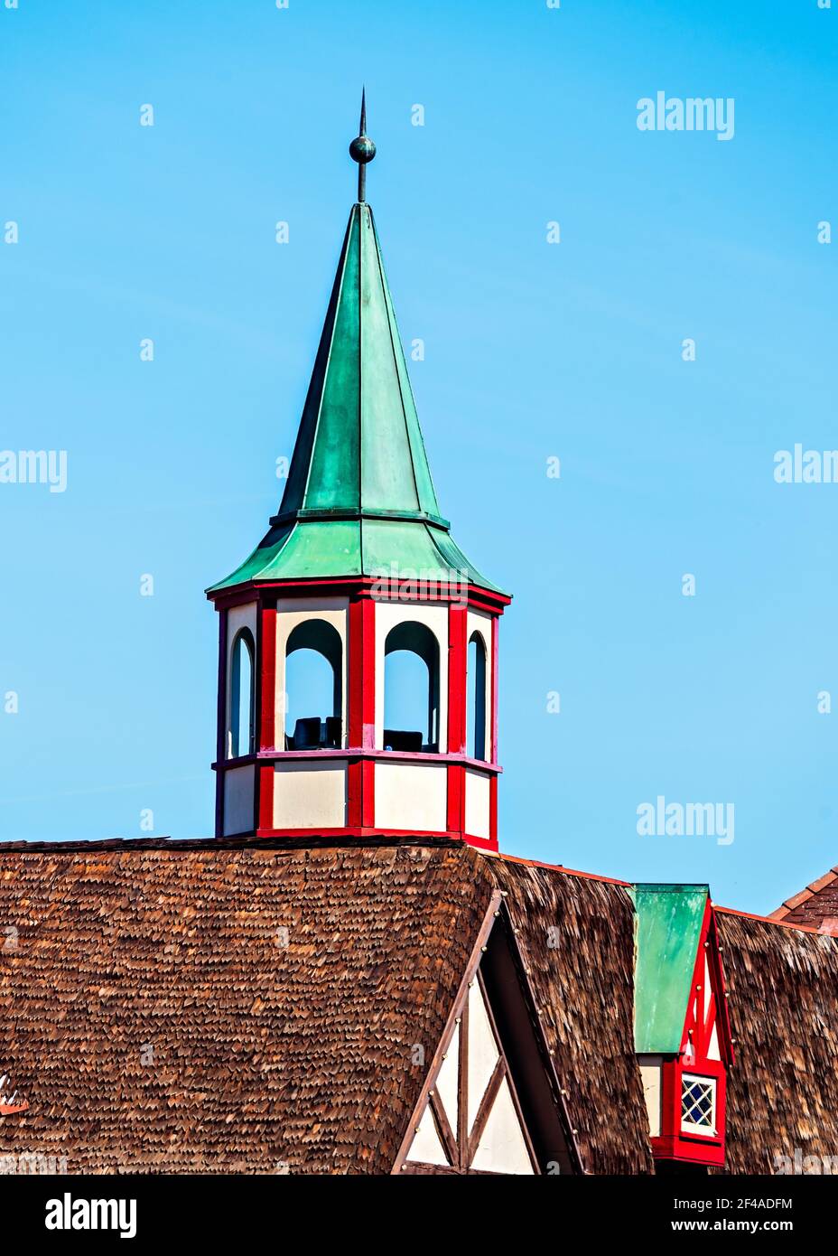 Green steeple on the top of a building Stock Photo