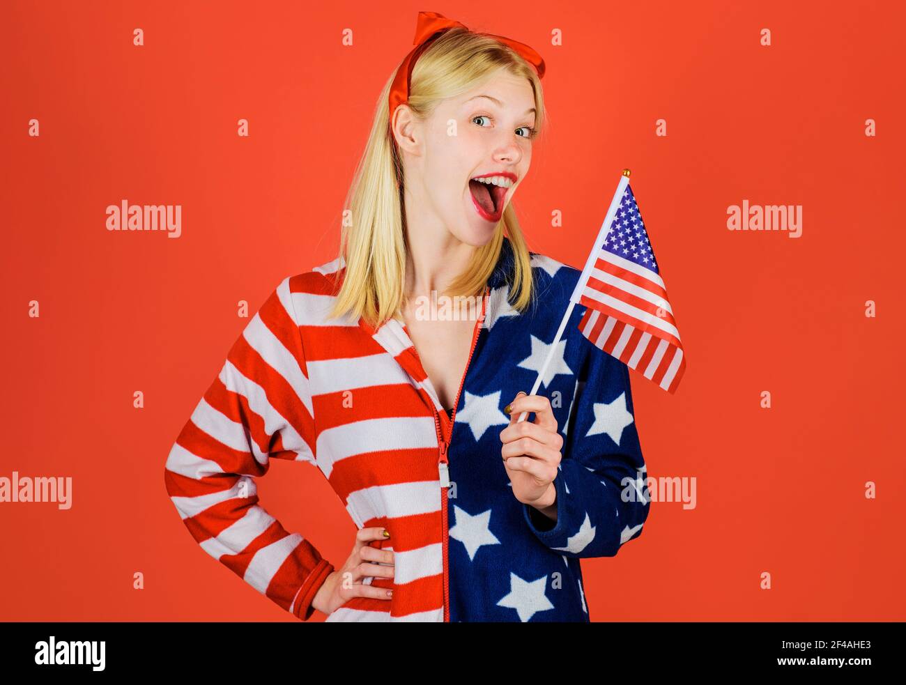 Happy Independence Day. Patriotic holiday. Smiling girl with American flag. USA celebrate 4th of July. Stock Photo