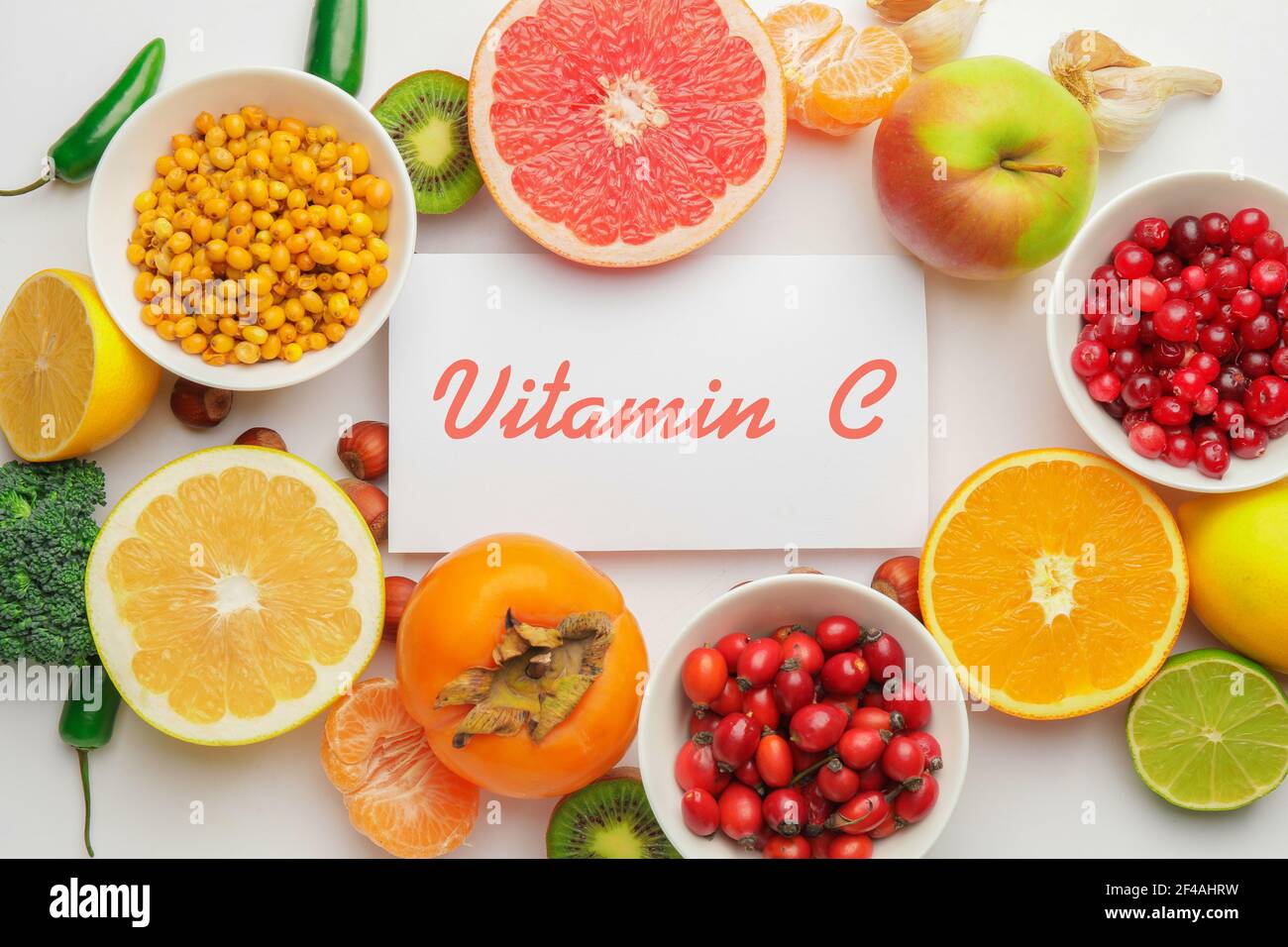 Healthy products rich in vitamin C on white background Stock Photo Alamy