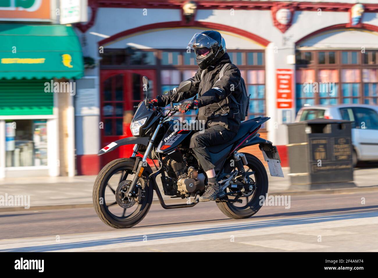 Lexmoto Assault 125 motorcycle being ridden in Southend on Sea, Essex, UK. Chinese import budget motorbike Stock Photo