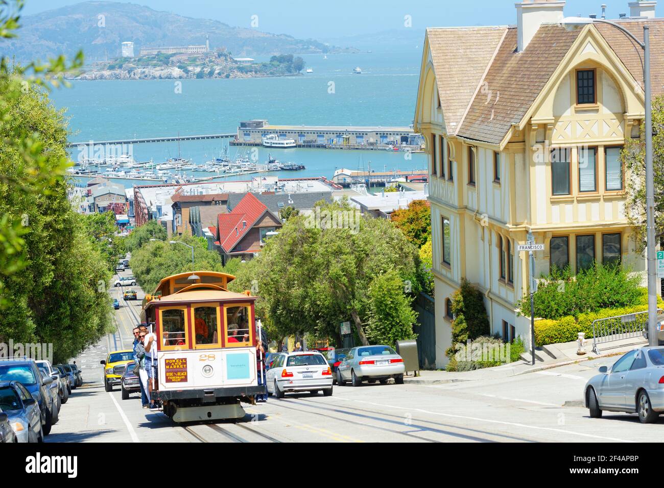 Powell-Hyde line cable car with Alcatraz Island in the background, San Francisco, California, USA Stock Photo