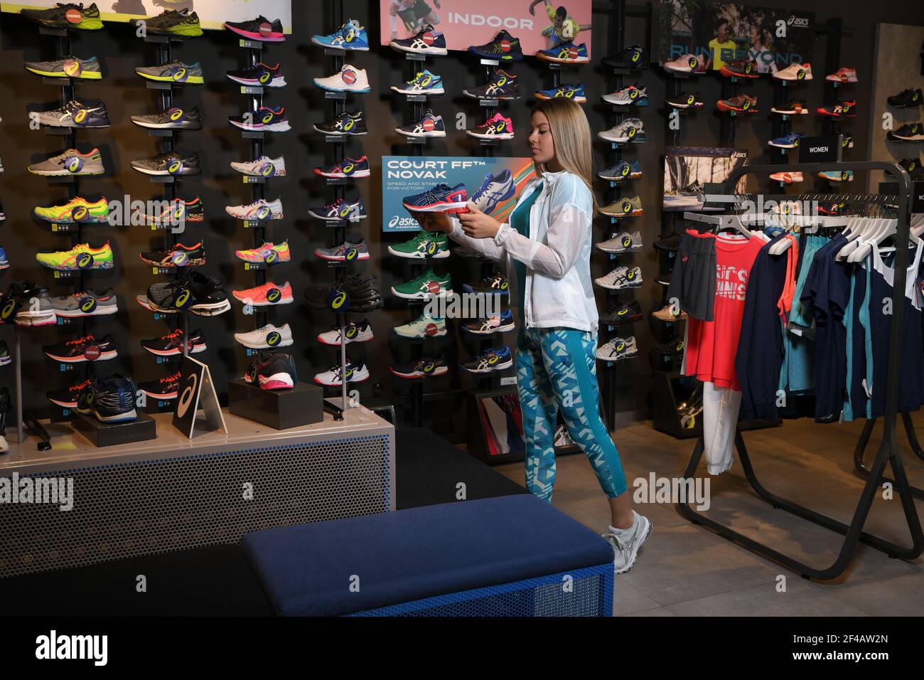 Skopje, Northern Macedonia - March 12, 2021: Asics store in Skopje,  Northern Macedonia. Girl photo model wearing tracksuits and sneakers ASICS  GEL Stock Photo - Alamy