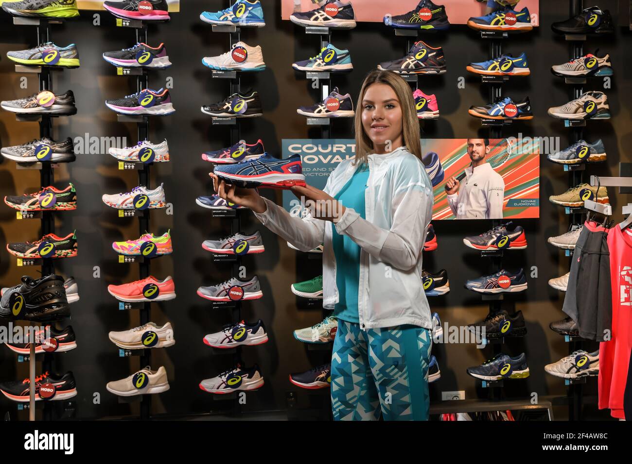 Skopje, Northern Macedonia - March 12, 2021: Asics store in Skopje,  Northern Macedonia. Girl photo model wearing tracksuits and sneakers ASICS  GEL Stock Photo - Alamy