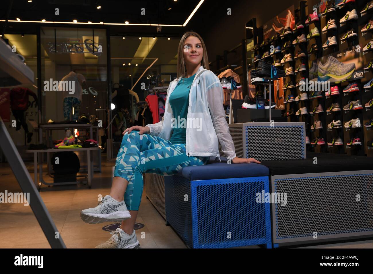 Skopje, Northern Macedonia - March 12, 2021: Asics store in Skopje,  Northern Macedonia. Girl photo model dressed in sportswear and sneakers  ASICS GEL Stock Photo - Alamy