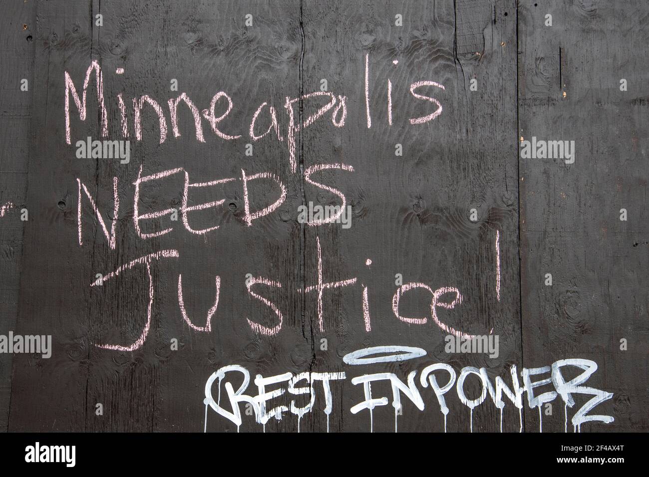 Minneapolis, Minnesota. Graffiti on building near the site of the Derek Chauvin trial who killed George Floyd. Stock Photo