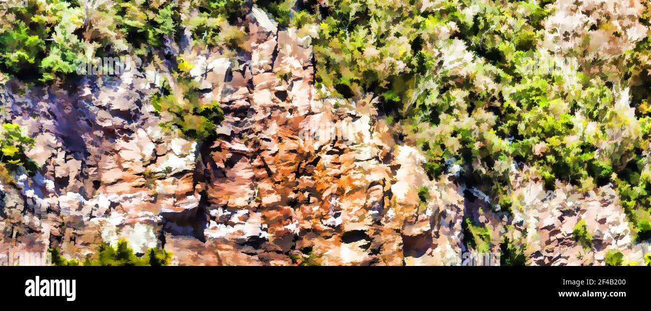 Surreal impression of a rugged rock cliff, where trees find a foothold