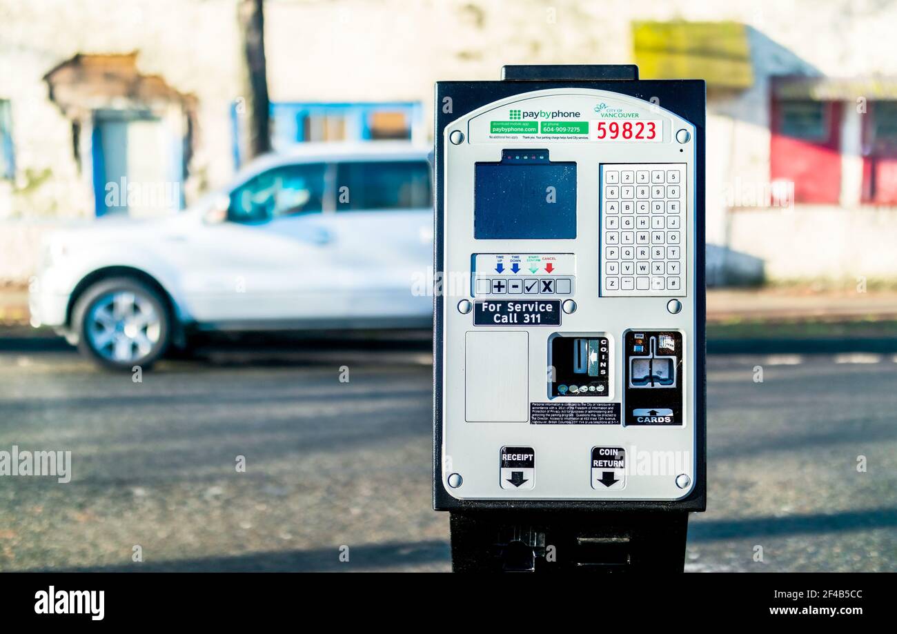 VANCOUVER, BC, CANADA - December, 22, 2020: PayByPhone parking meter. Register vehicle license plate and credit card to pay for parking. Used for time Stock Photo