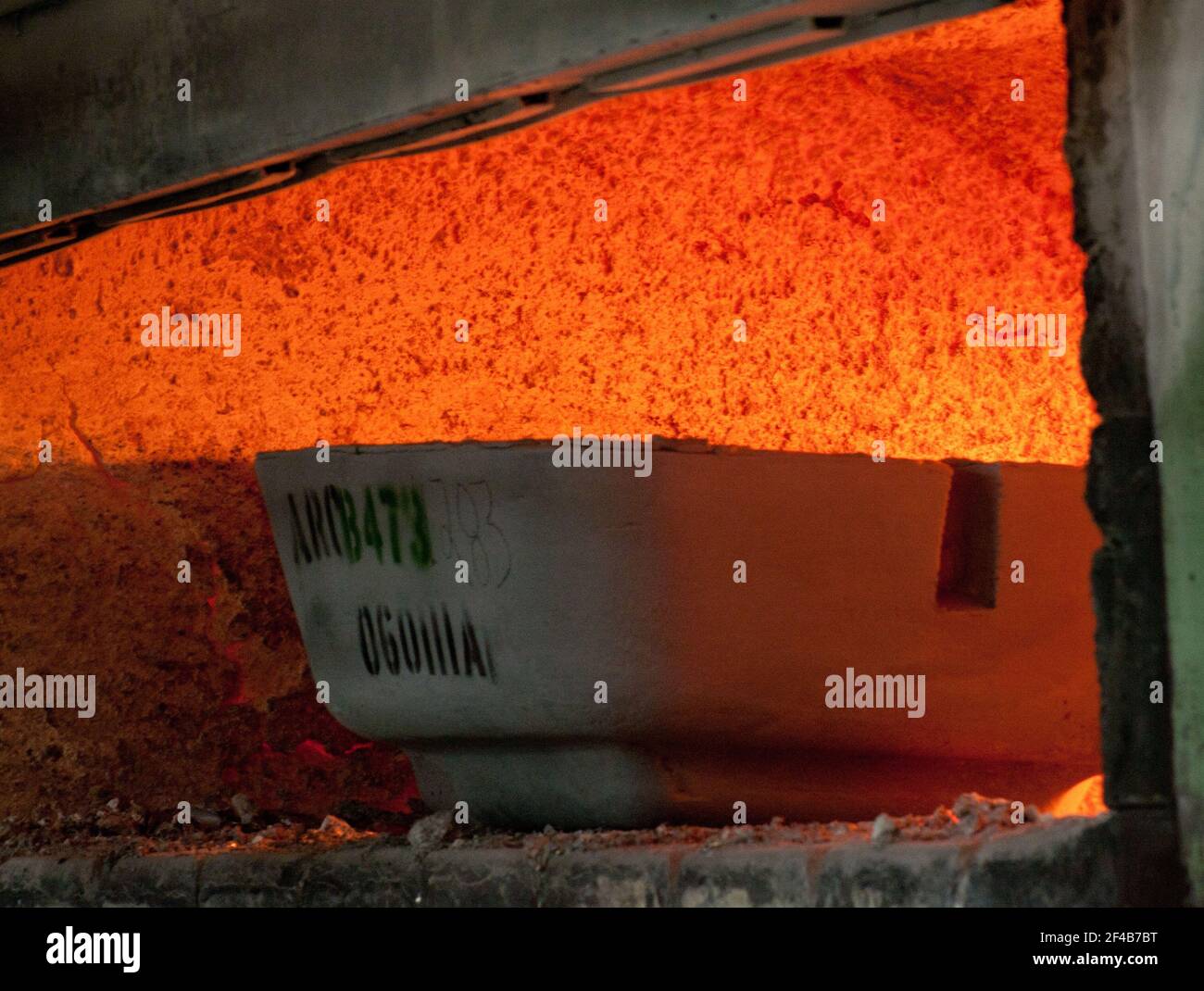 Looking into a melting furnace in a foundry for aluminum casting