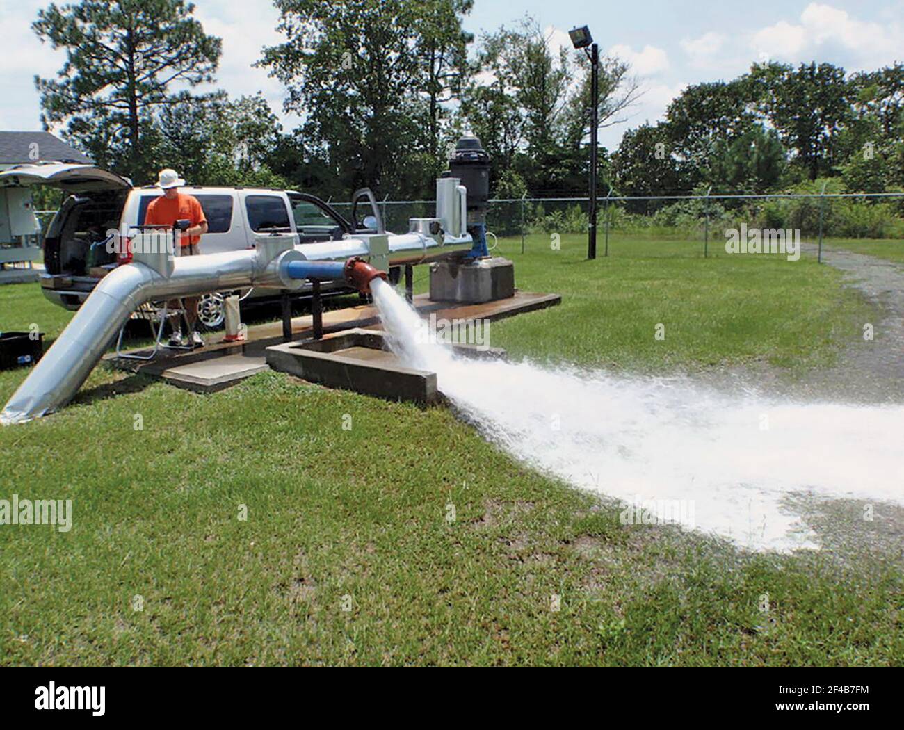 Worker flushing a public supply well in northern Florida ca. 2010 Stock Photo