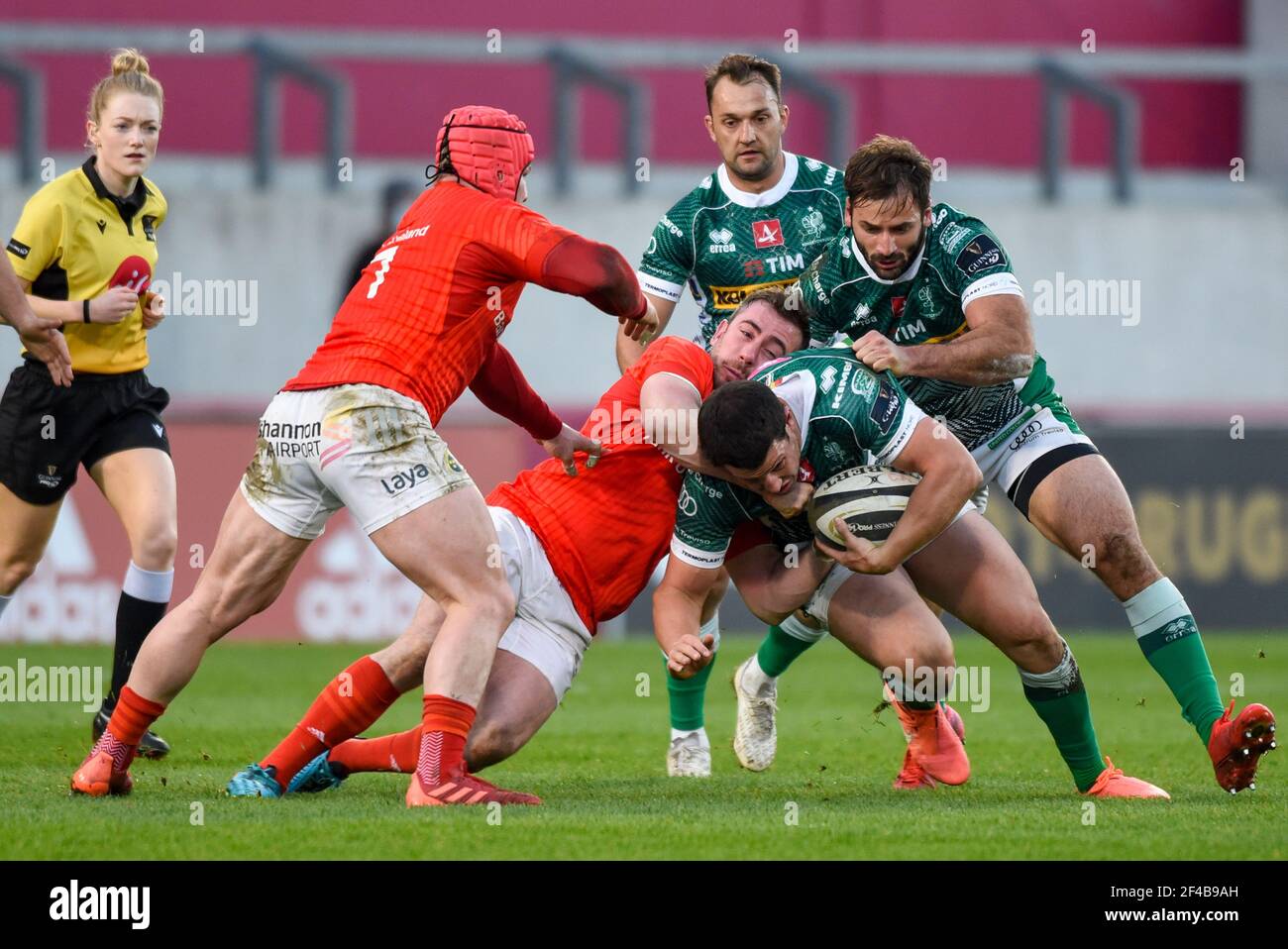 Limerick, Ireland. 19th Mar 2021. Rory Scannell of Munster tackled by JJ  Hanrahan of Munster during the Guinness PRO14 Round 16 match between Munster  Rugby and Benetton Rugby at Thomond Park in