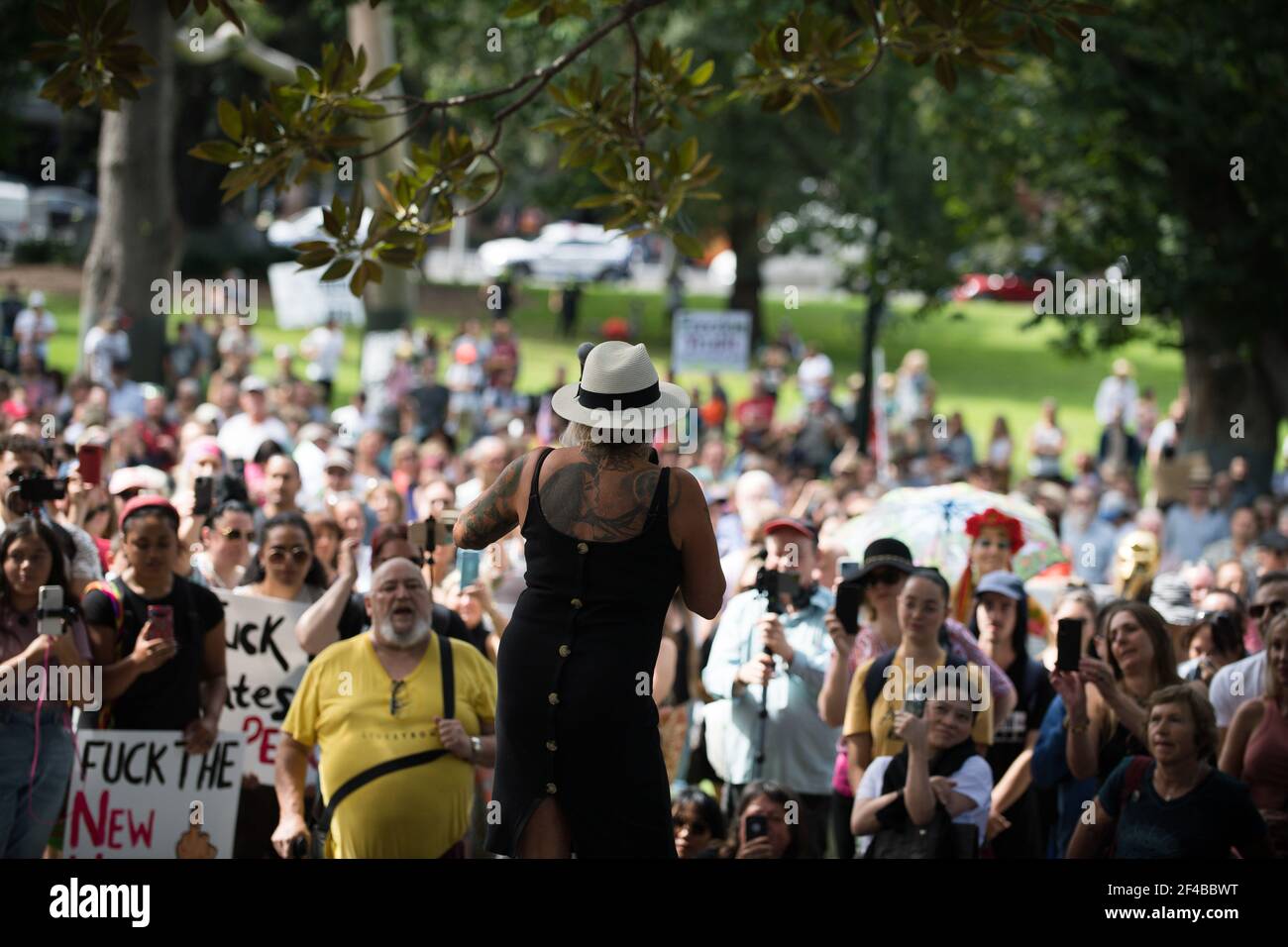 Melbourne, Australia 20 March 2021, A speaker and the crowd at a freedom rally in Flagstaff Gardens. A demonstration as part of a planned 'World Wide Rally for Freedom' that was organised to calling for freedom of choice, speech and movement. Credit: Michael Currie/Alamy Live News Stock Photo
