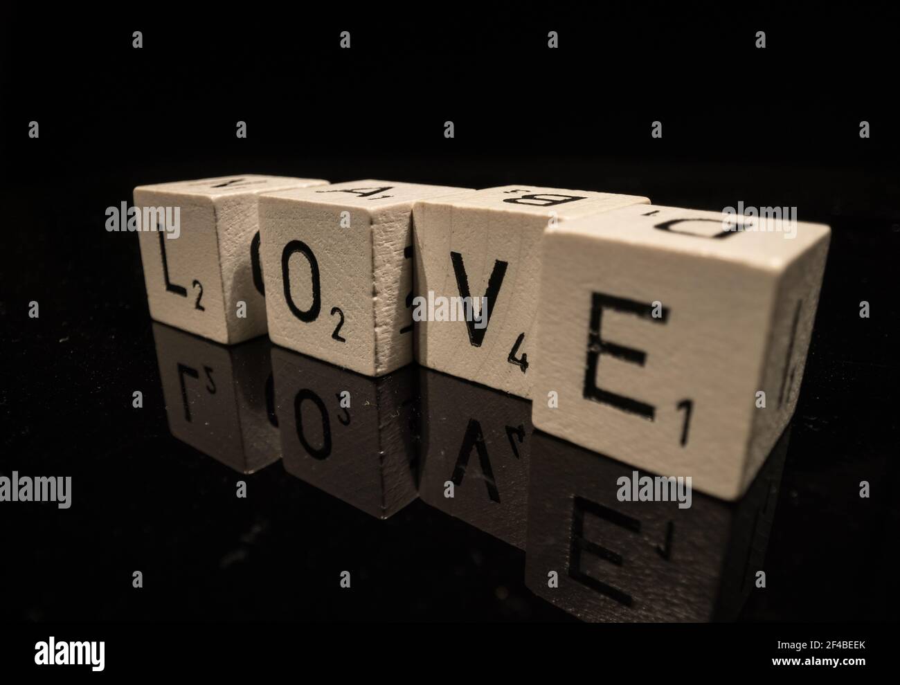 Letters on cubes write the word Love Stock Photo