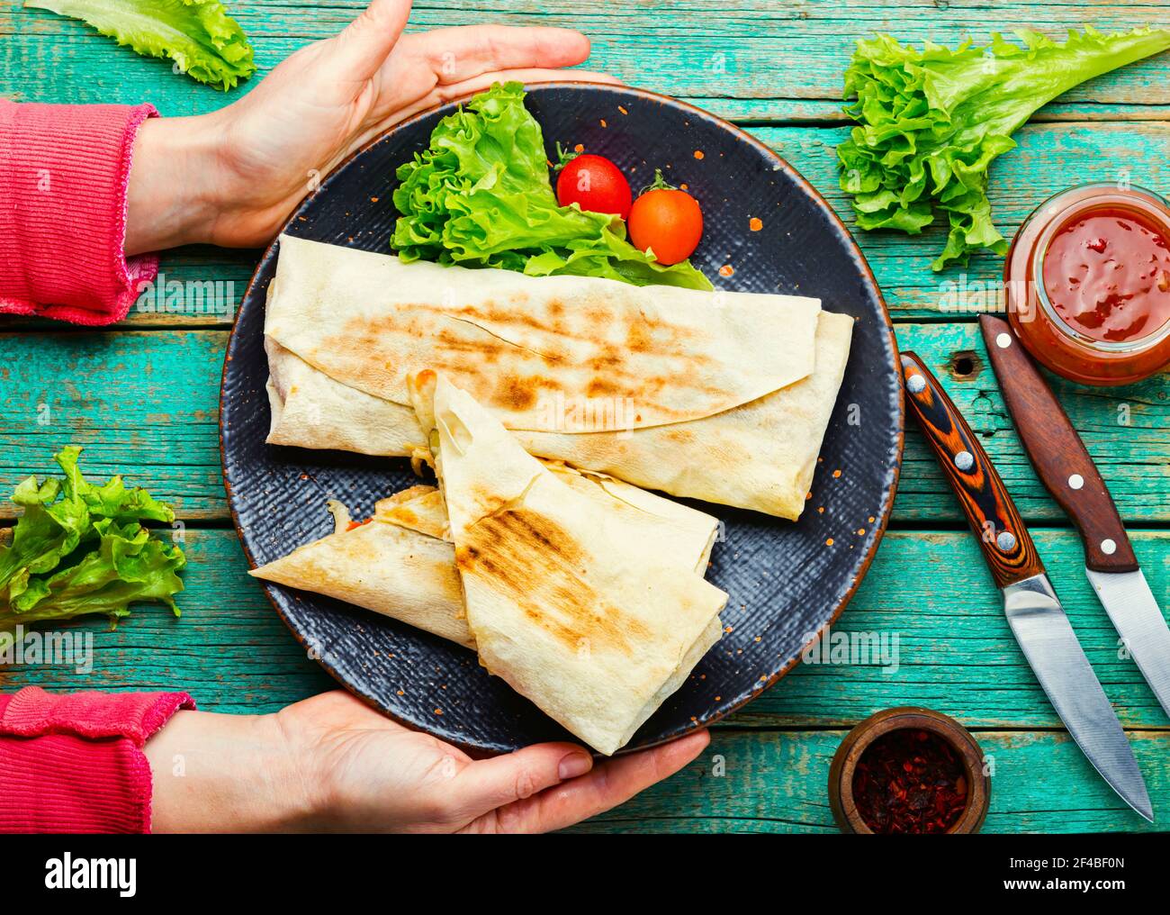 Shawarma,Eastern dish made from fried chicken meat wrapped in lavash.Turkish  food.Doner kebab Stock Photo - Alamy