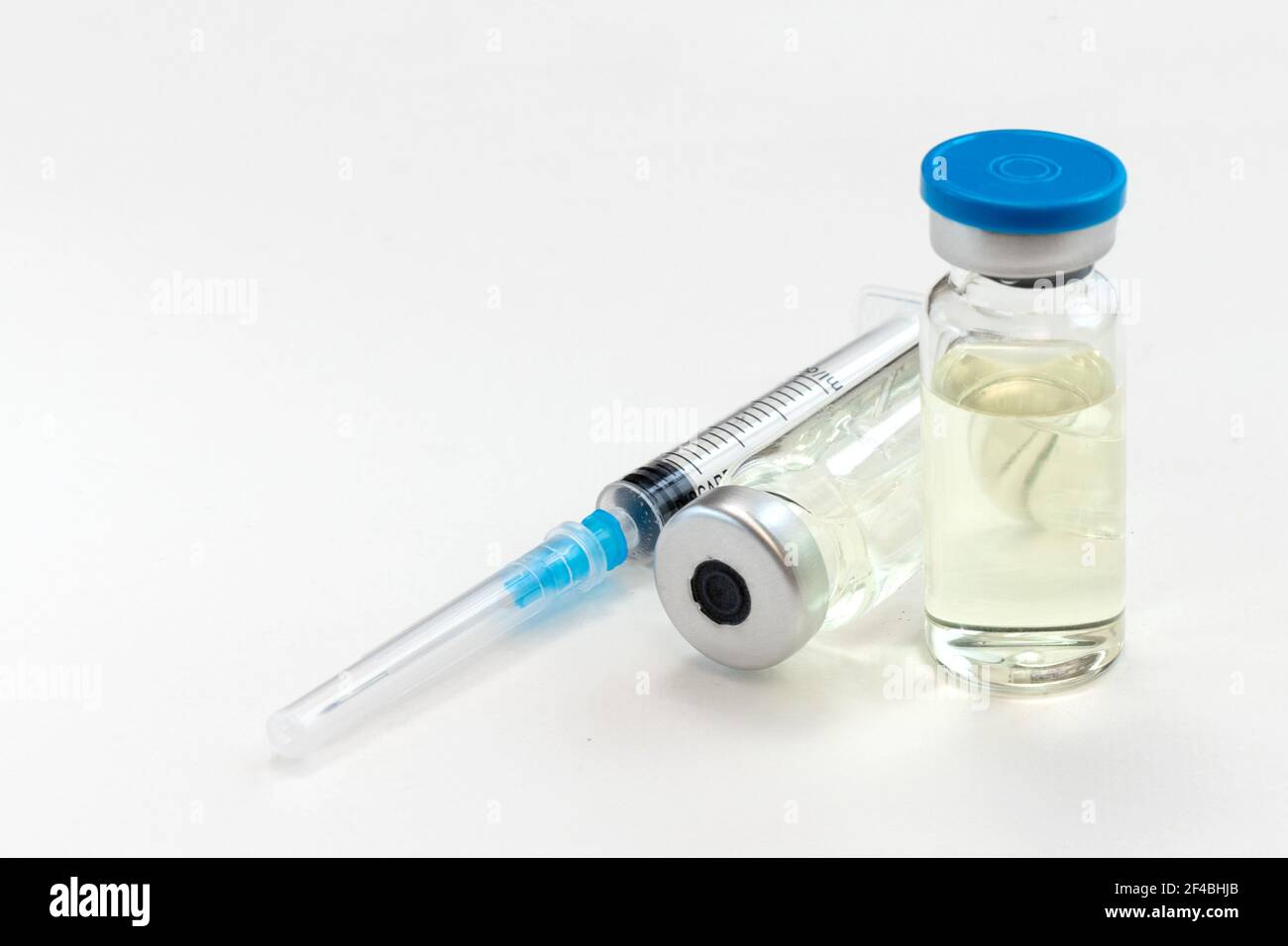 Medicine bottle for injection and syringe for vaccination isolated on ...
