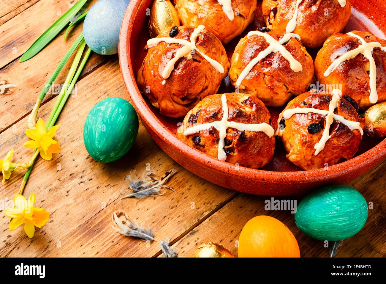 Easter hot cross buns and holiday decor.Easter baked goods Stock Photo