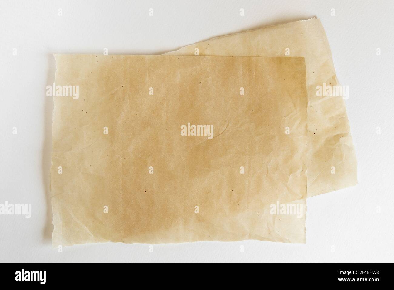 Baking paper sheet isolated on white background, top view. Parchment