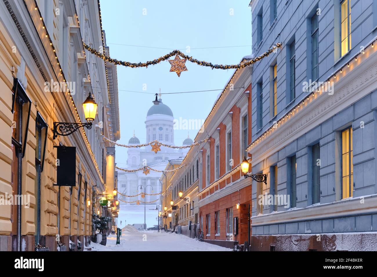 View of Helsinki Cathedral through the Sofiankatu street during the strong snowstorm. The most famous landmark in Helsinki. Sofiankatu street with Chr Stock Photo