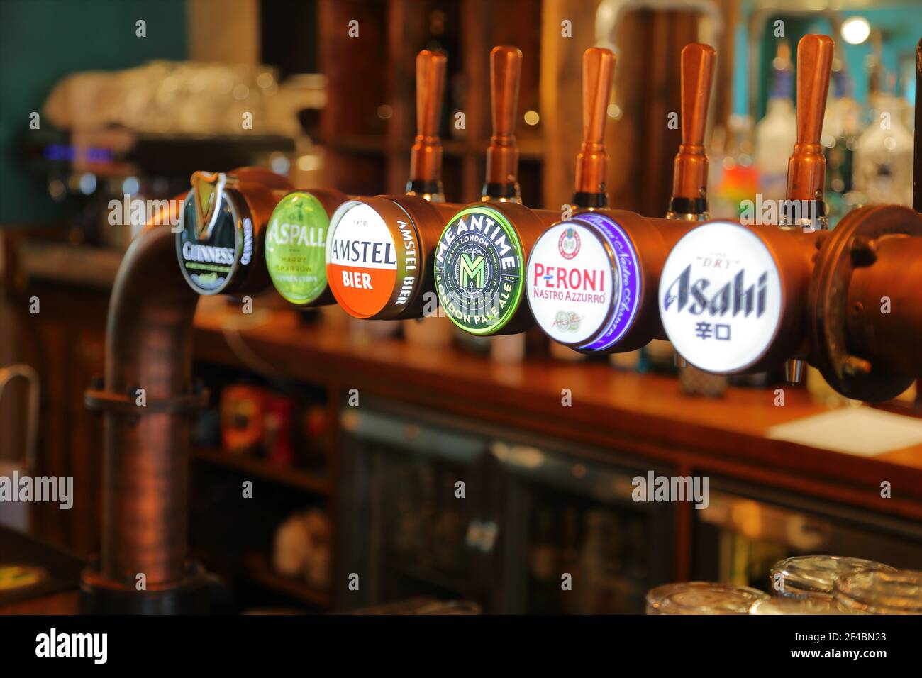 A line of beer taps in a pub Stock Photo Alamy