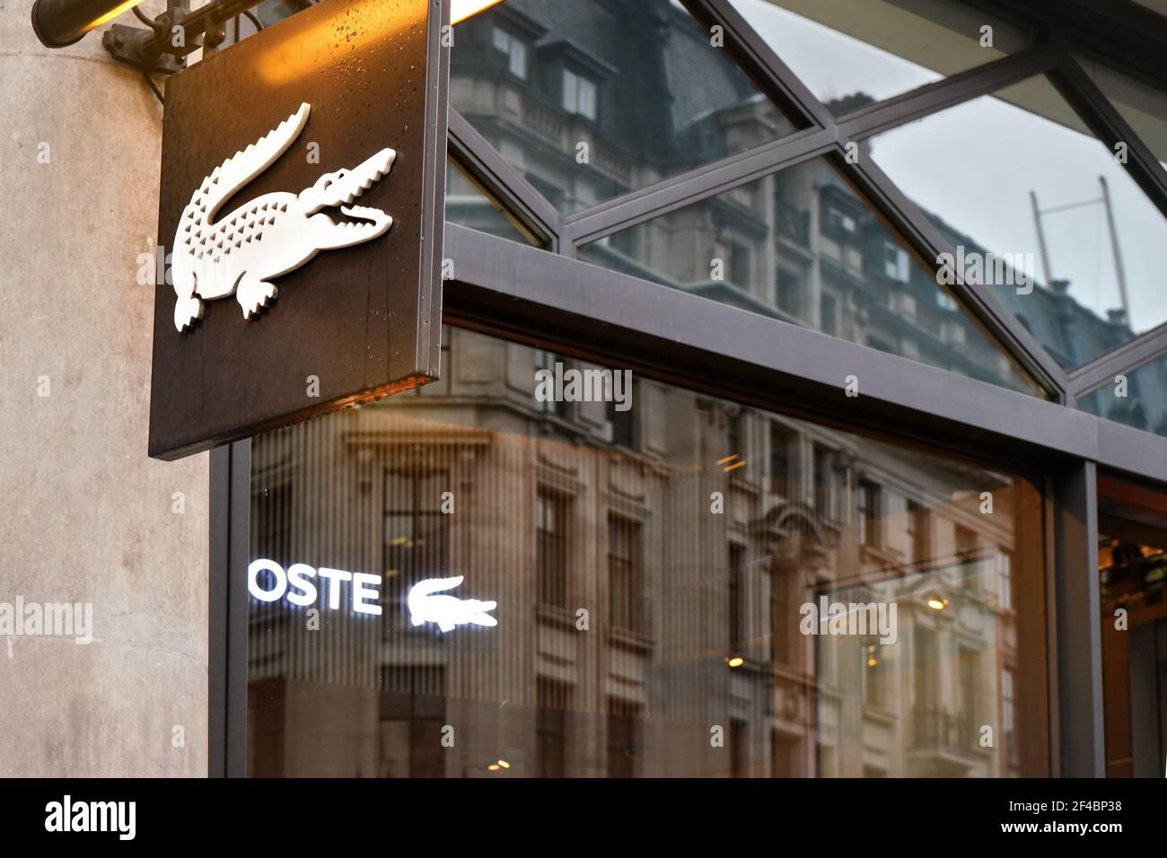 London, United Kingdom - February 01, 2019: Lacoste crocodile logo on their shop on Regent Street. It is French clothing , footwear and sportswear bra Stock Photo