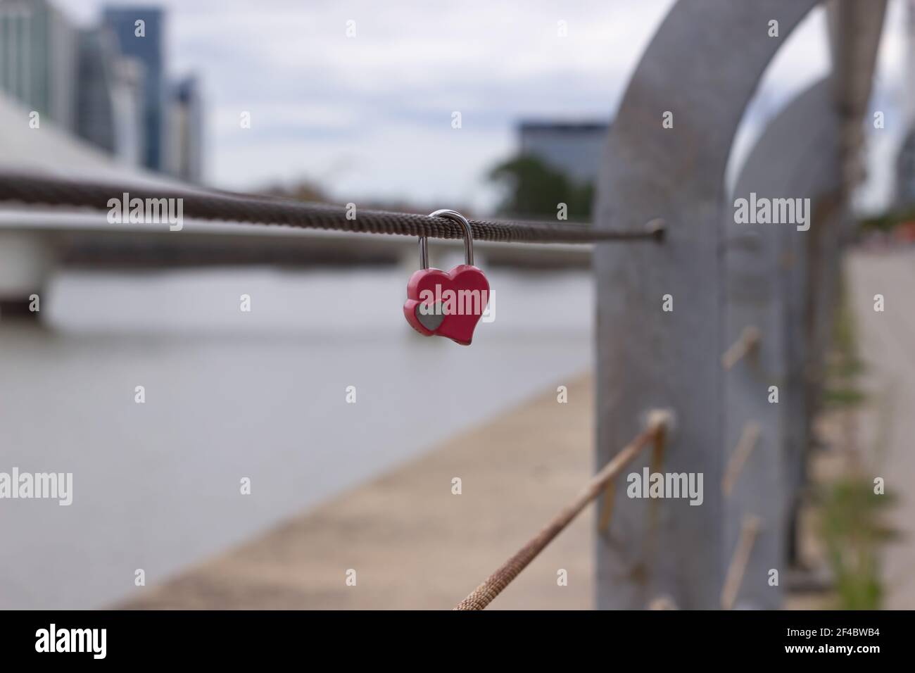 Old love padlock by the river. Stock Photo