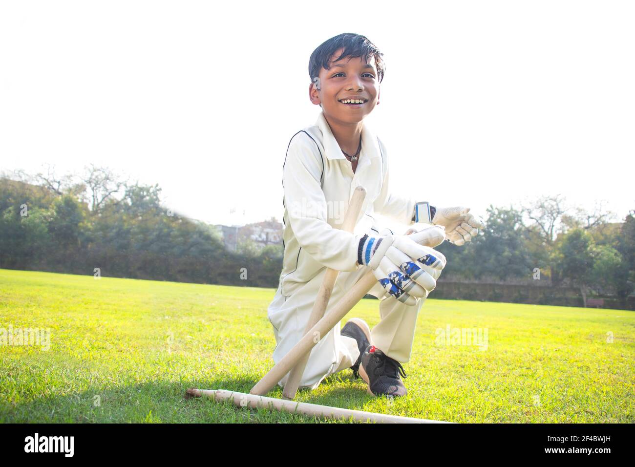 a boy wicket keeper stumping a during cricket game Stock Photo Alamy