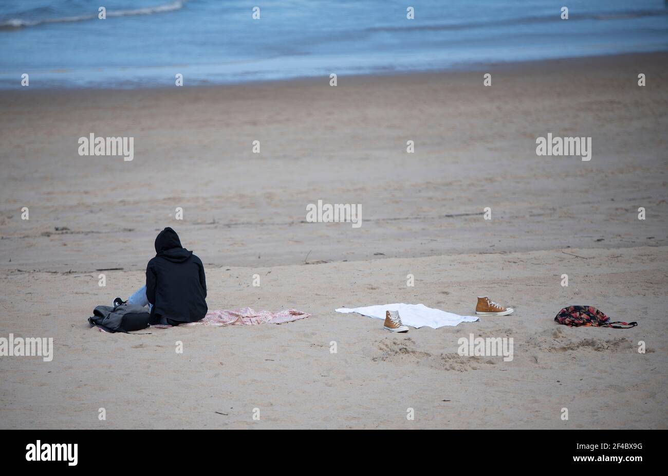 sitting on the beach looking at the sea Stock Photo - Alamy