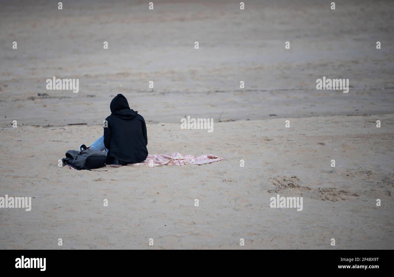sitting on the beach looking at the sea Stock Photo - Alamy