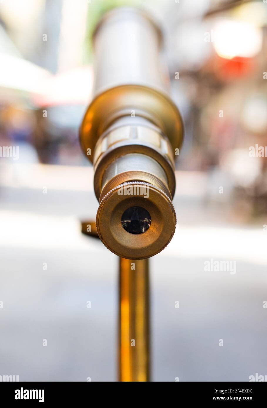 Telescope in a street in Hong Kong where vendors sell antiques, bric-a-brac and curios Stock Photo
