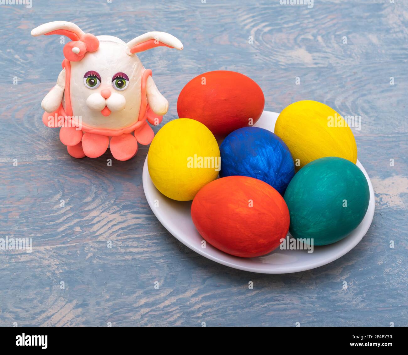 Happy Easter concept. Hand-painted Easter eggs and a hand-made ...