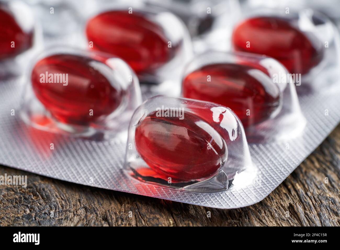 Krill oil capsules in a half used blister pack, closeup Stock Photo