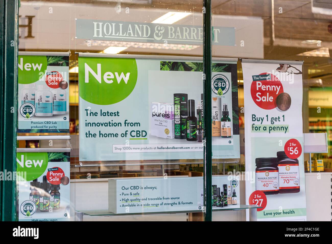 Woodbridge, Suffolk, UK February 10 2021: A shop display in the UK showing the now legal CBD oil products. Alternative natural medicine concept Stock Photo