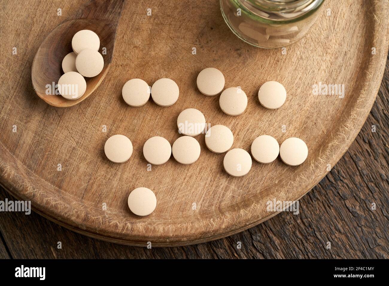 Brewer's yeast tablets - nutritional supplement rich in vitamin B, top view Stock Photo