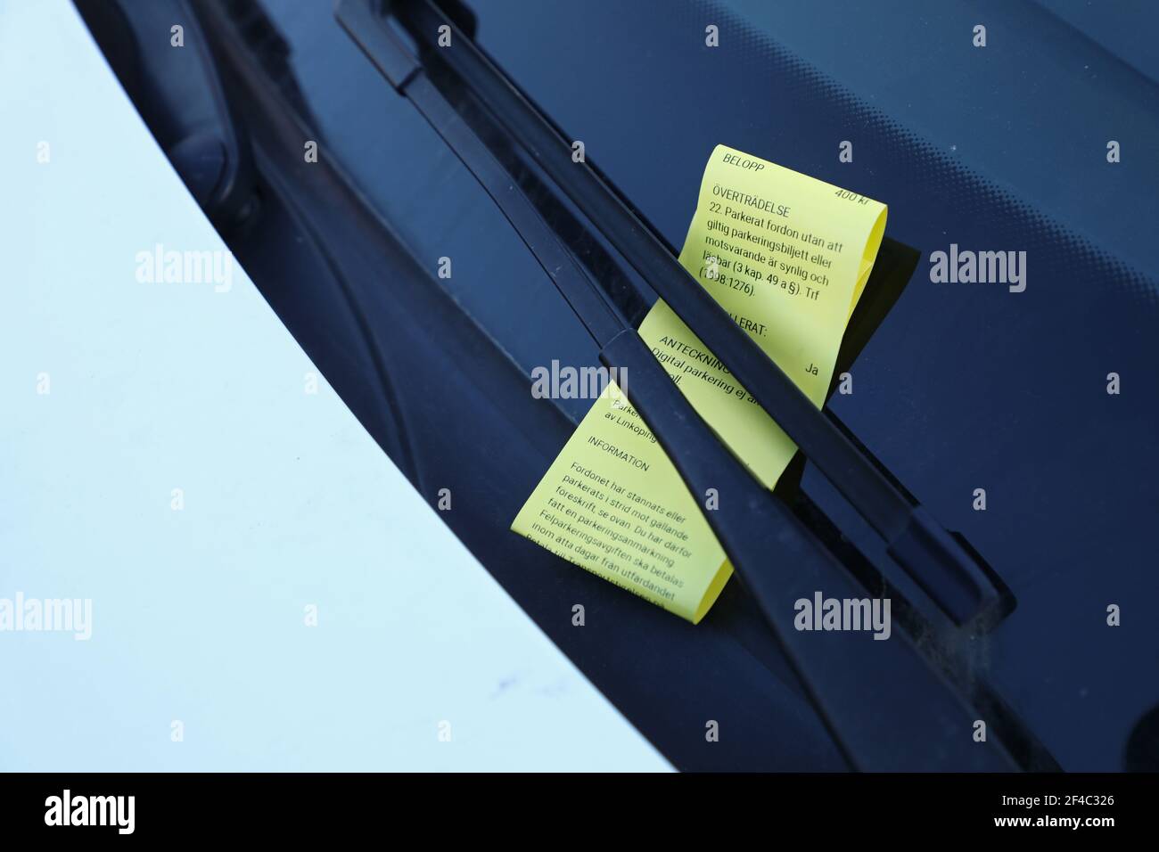 Parking fine at a car Stock Photo - Alamy