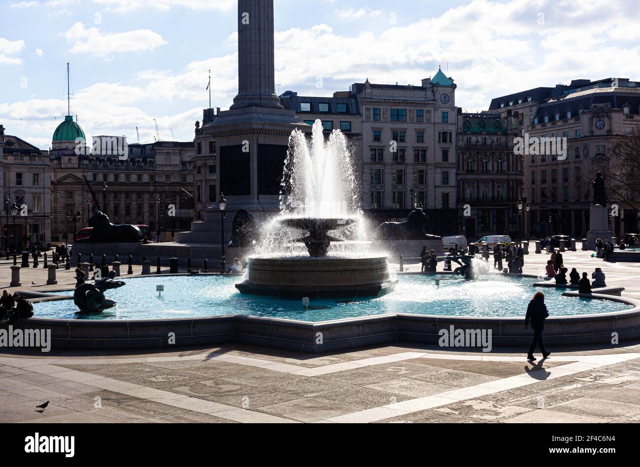 One of Trafalgar Square water fountains, Central London, England, UK. Stock Photo