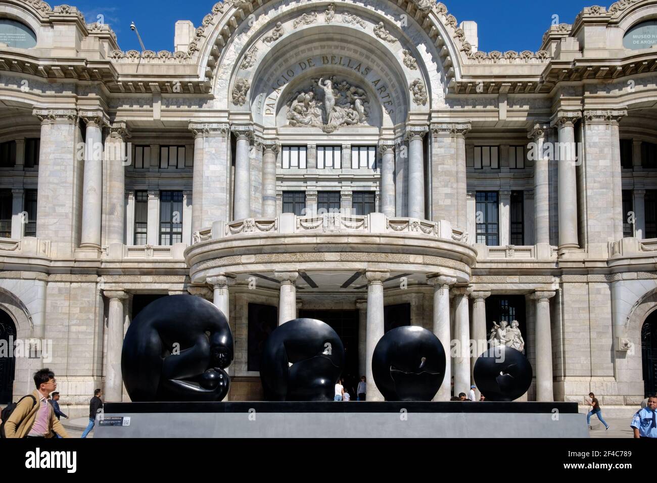 A satute by artist Jimenez Deredia sits in front of the Palacio de Bellas Artes (Palace of Fine Arts) in Mexico City, Mexico. Stock Photo