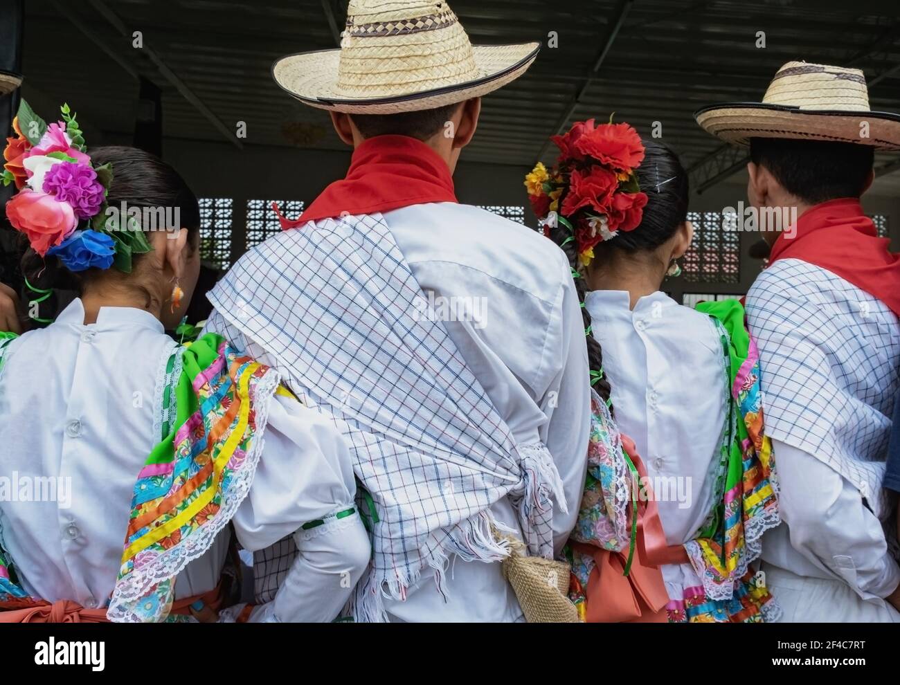 Dancers dressed in traditional costumes wait to perform in Libano, Tolima, Colombia Stock Photo