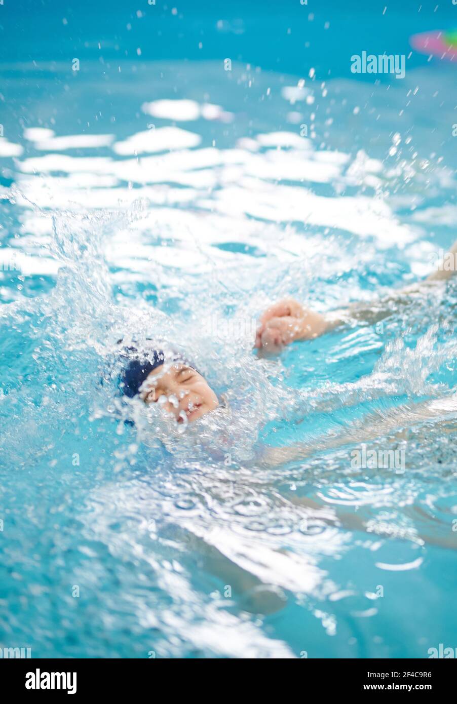 Small kid learn to dive in pool. Kid drowning in pool water background Stock Photo Alamy