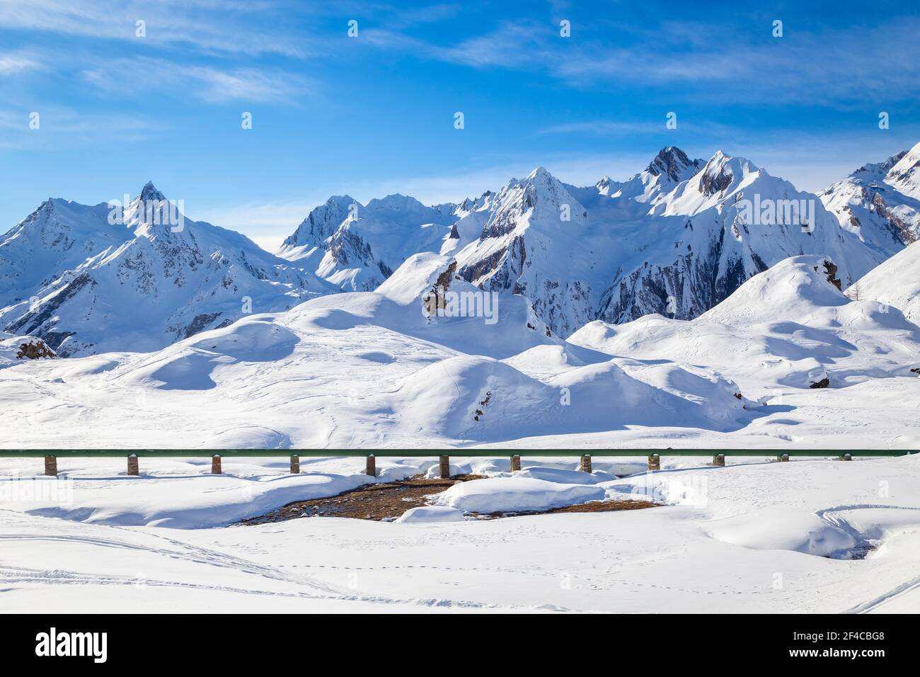 View of a pipeline from the dams of the high Formazza Valley in winter. Riale, Formazza, Valle Formazza, Verbano Cusio Ossola, Piedmont, Italy. Stock Photo
