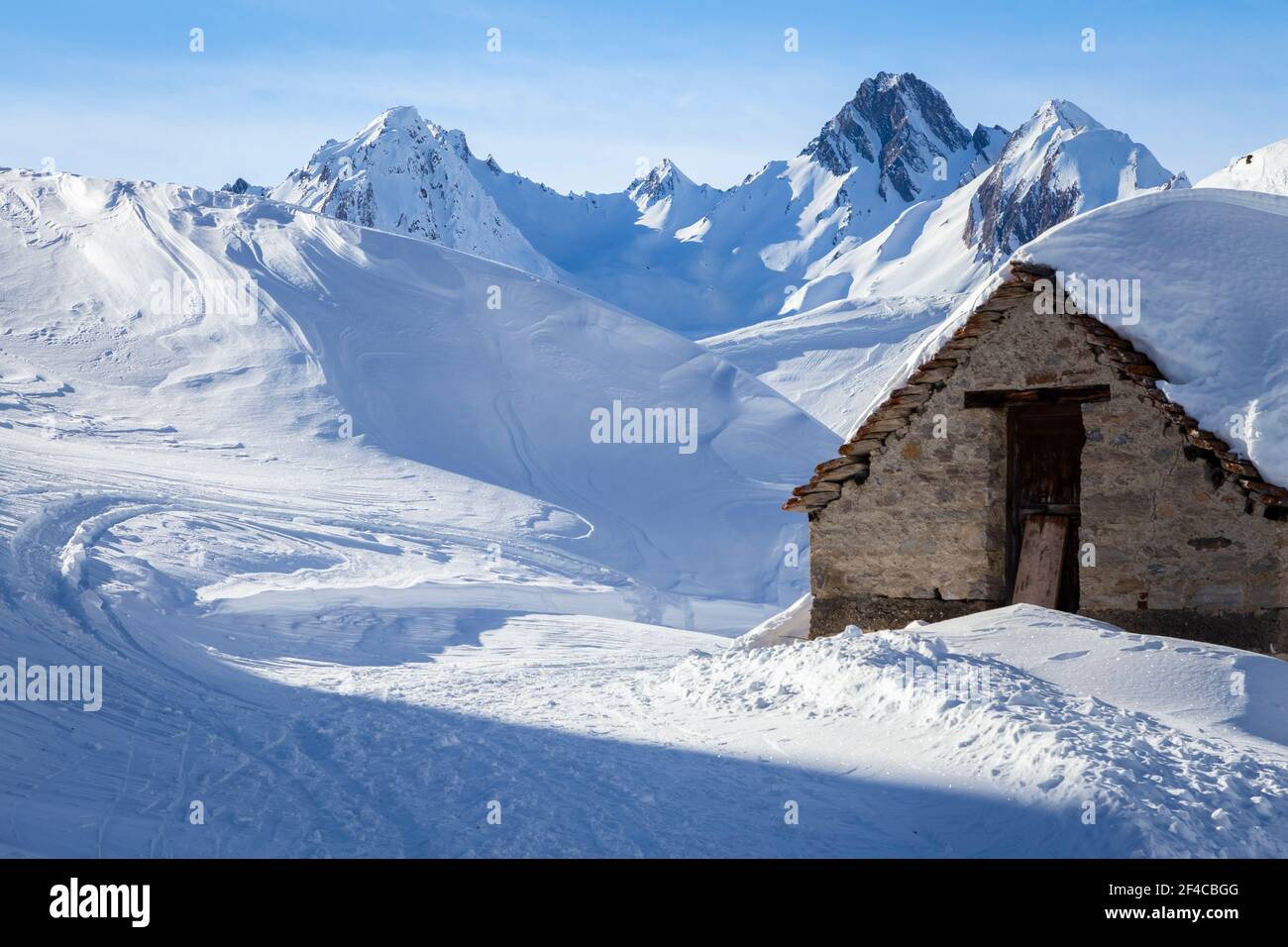 View of the Maria Luisa refuge in the high Formazza Valley in winter. Riale, Formazza, Valle Formazza, Verbano Cusio Ossola, Piedmont, Italy. Stock Photo