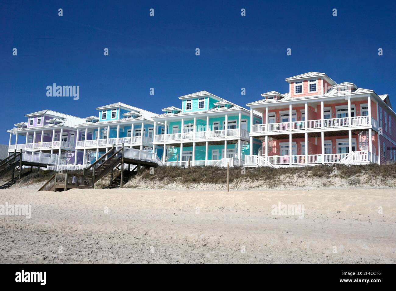Row of multicolored beach houses Stock Photo
