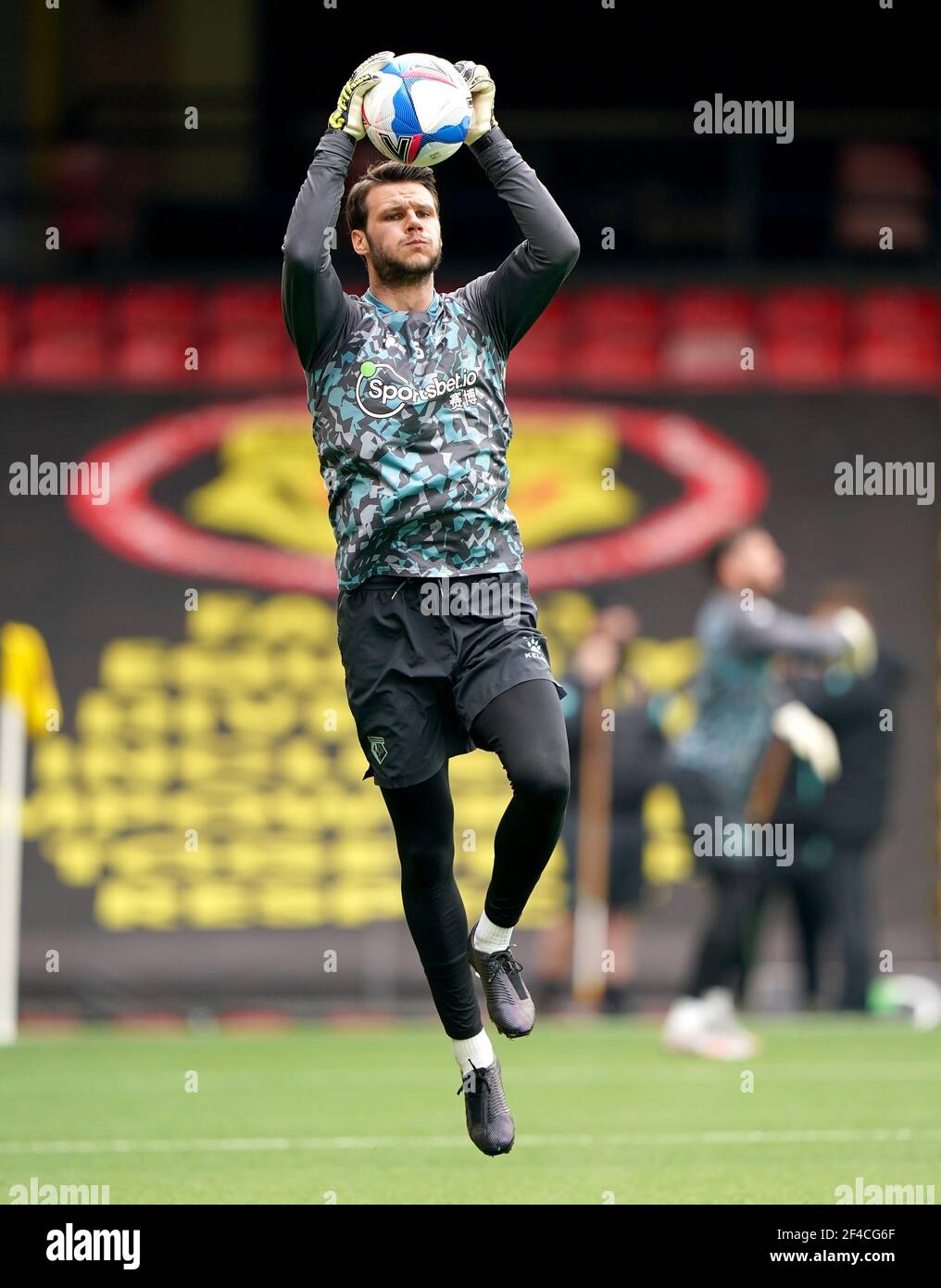 Watford goalkeeper Daniel Bachmann warms up on the pitch ahead of the ...