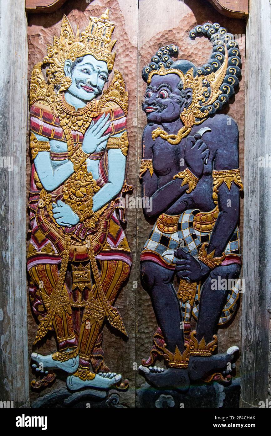 Wood carving on the doors at Balinese Hindu temple - Bali, Indonesia Stock Photo